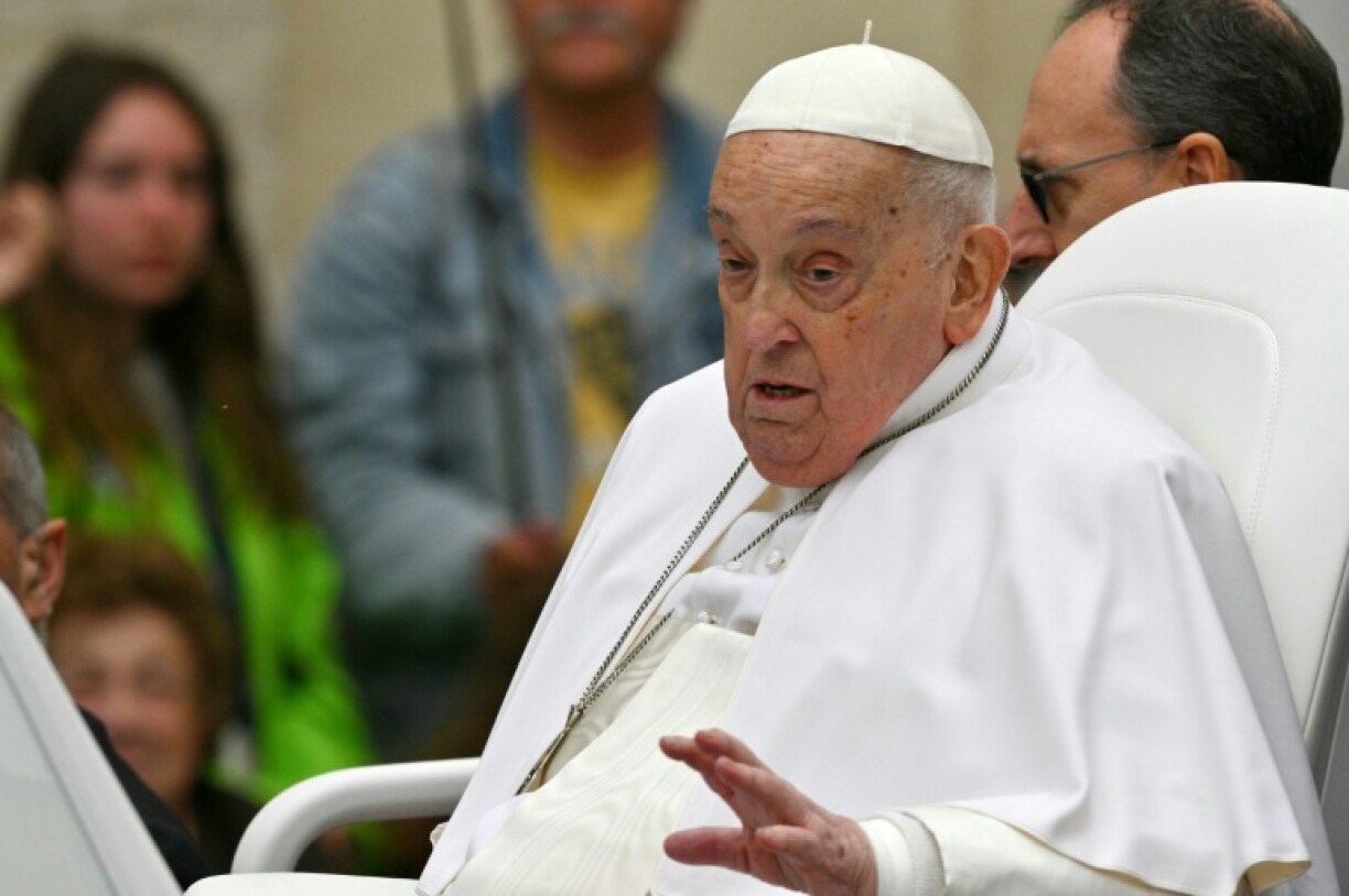Pope Francis waves after Easter mass at St Peter's square in the Vatican on April 20, 2025