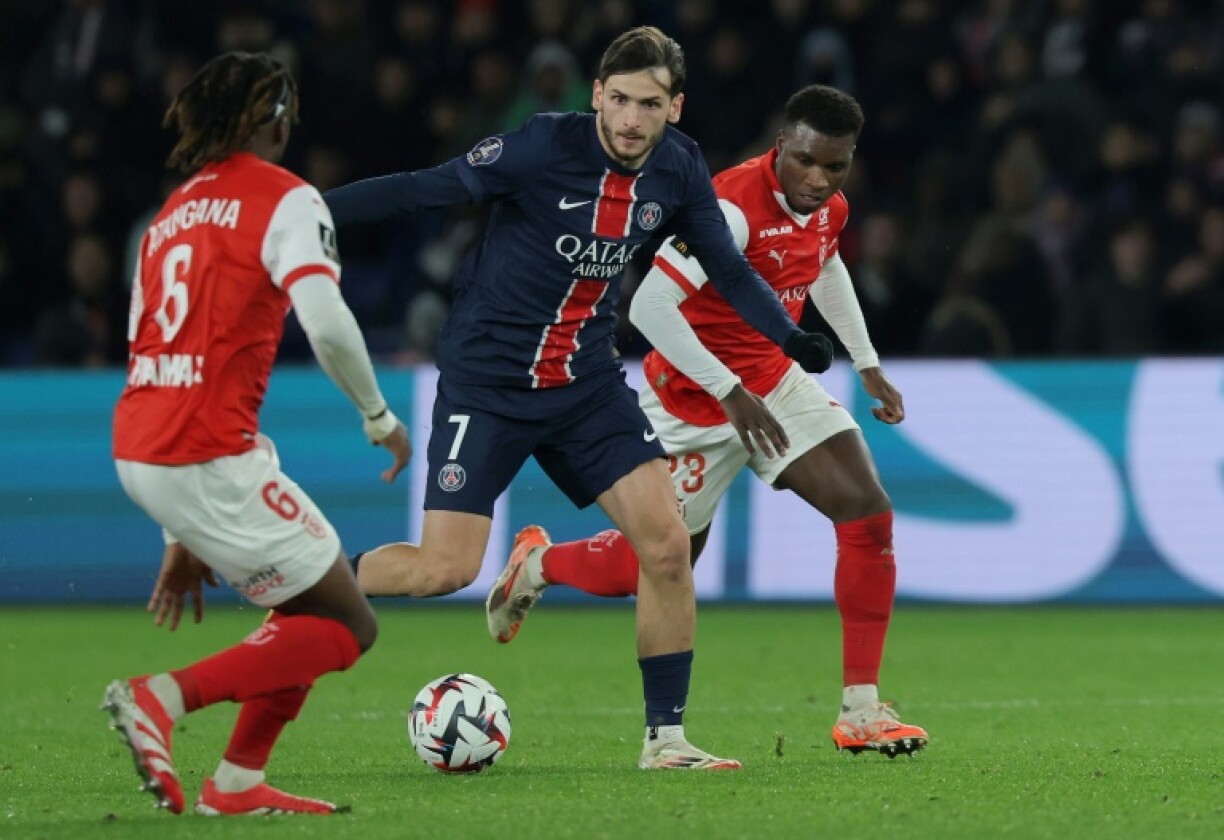 Khvicha Kvaratskhelia (C) made his PSG debut against Reims on Saturday