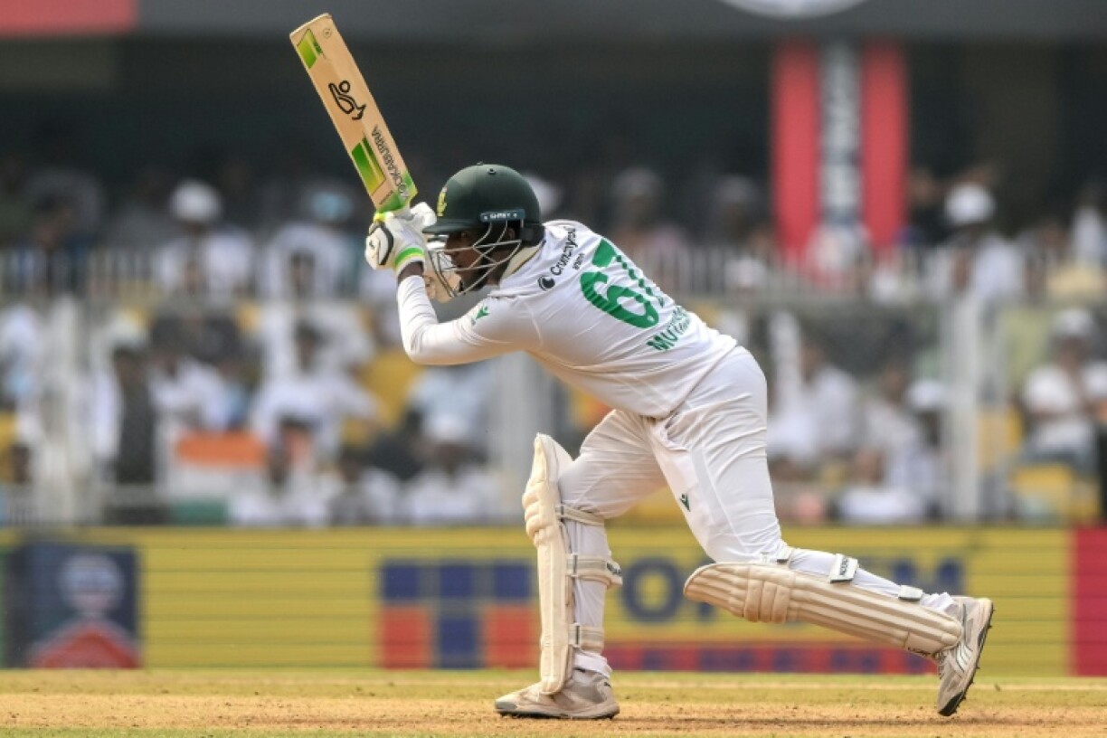 South Africa's Senuran Muthusamy onthe drive during his maiden Test century against India in Guwahati