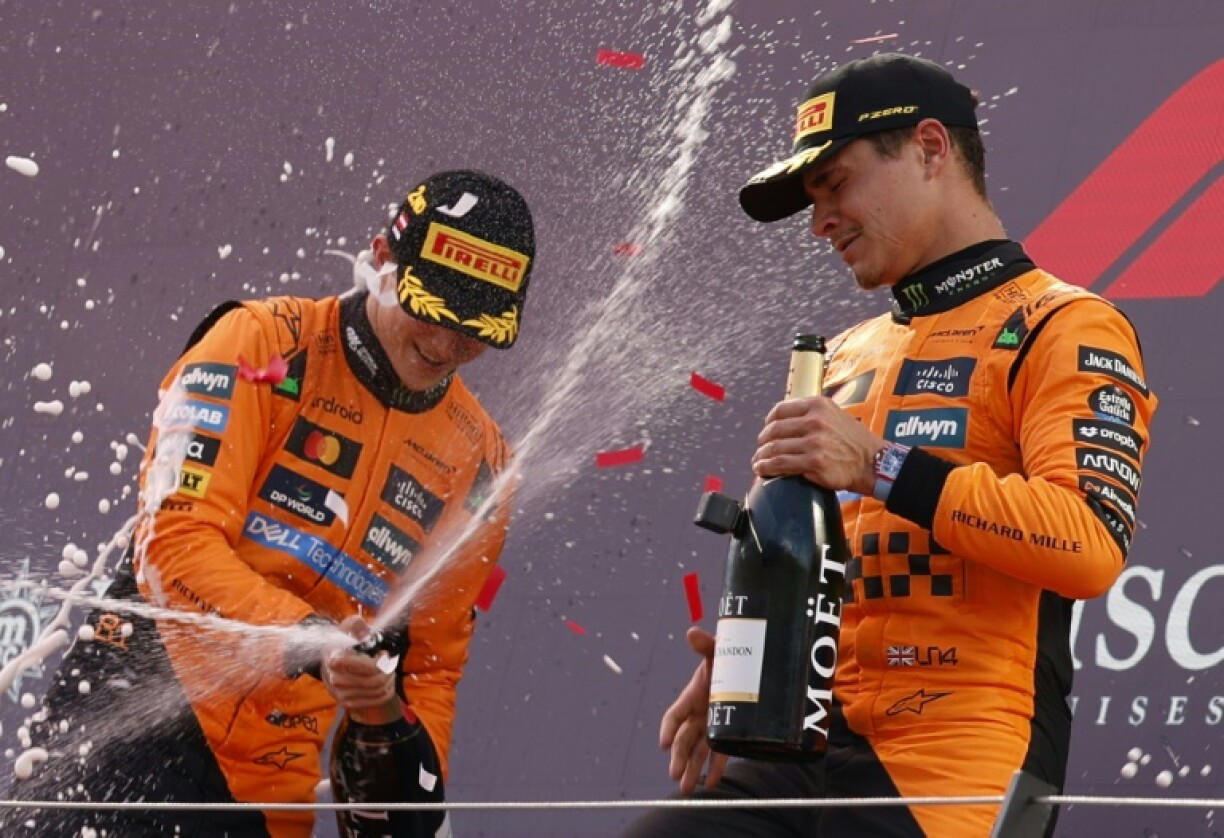 Lando Norris (R) claimed his third race win of the season in Spielberg