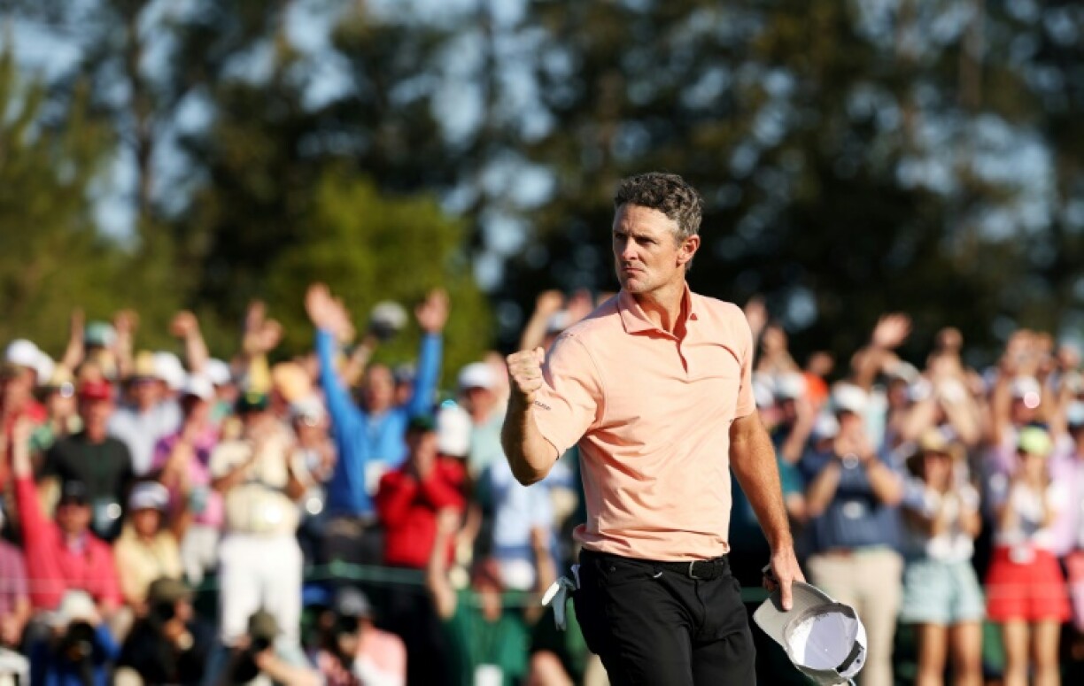 England's Justin Rose reacts after putting for birdie at the 72nd hole of the Masters, before falling to Rory McIlroy in a playoff