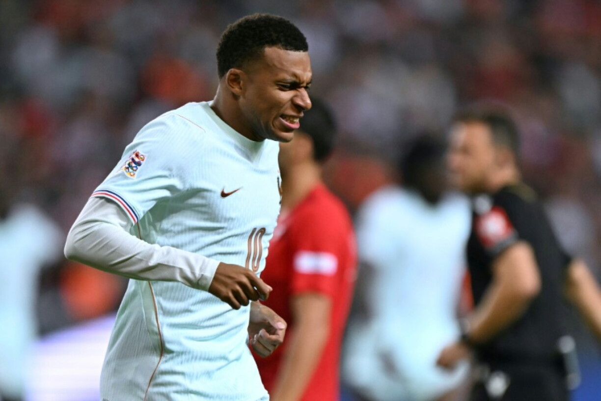 Kylian Mbappe feels pain in his left knee after scoring for France against Turkey on Friday
