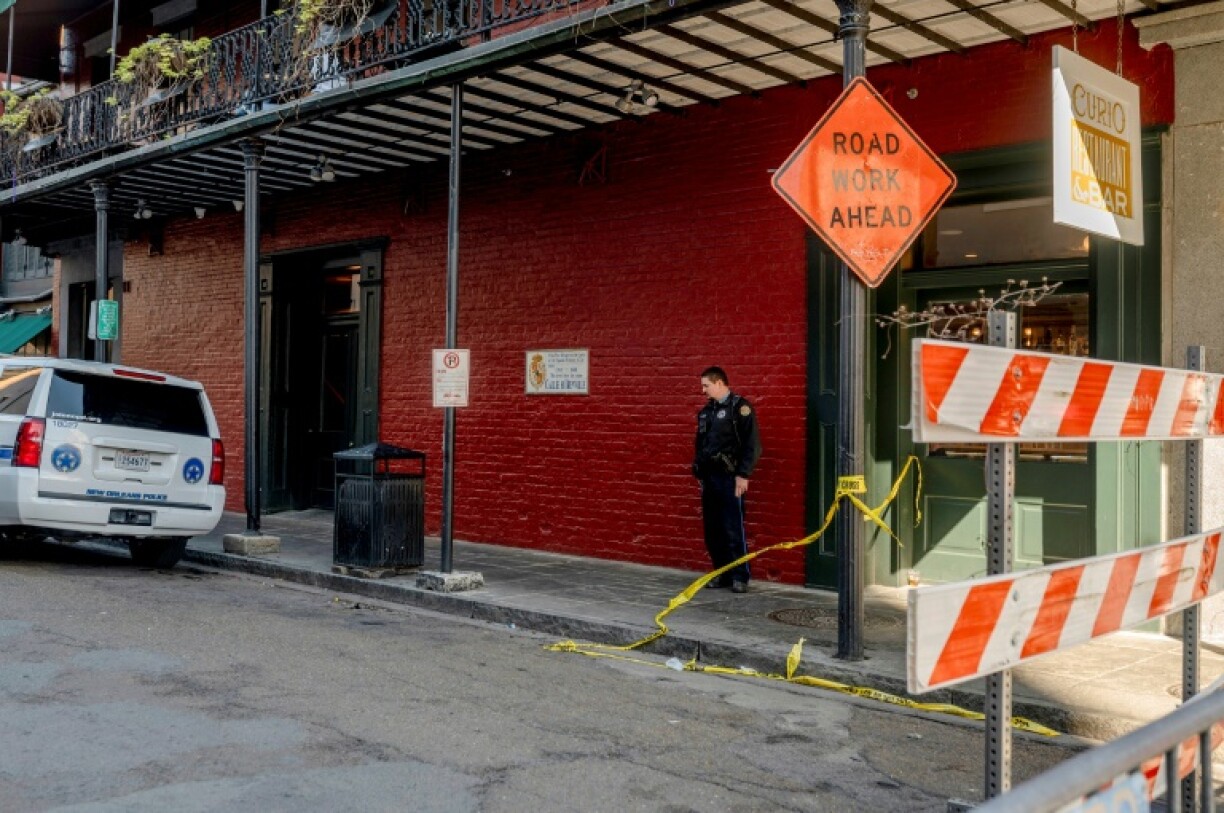 The French Quarter, near Bourbon Street, is blocked off by a heavy police and FBI presence after a truck plowed into a crowd of New Year's revelers, killing 15