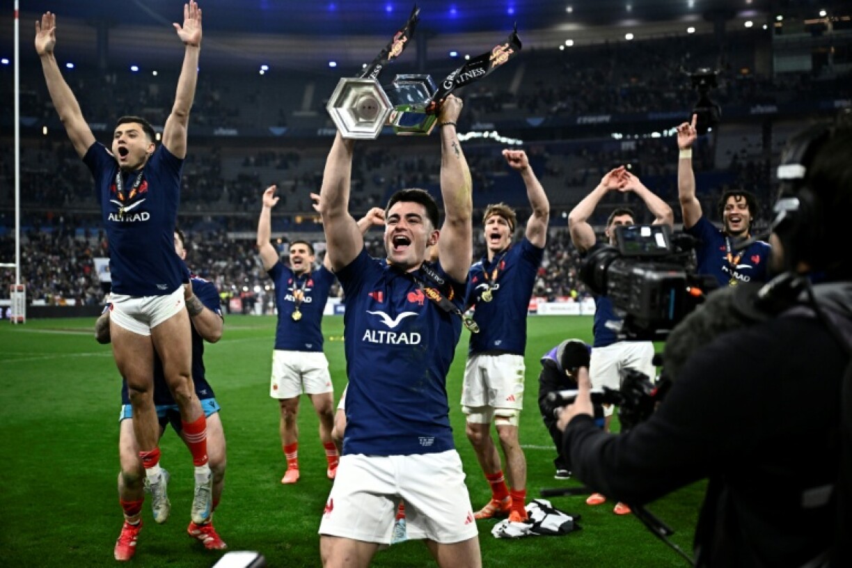 Nolann Le Garrec lifts the Six Nations trophy in March