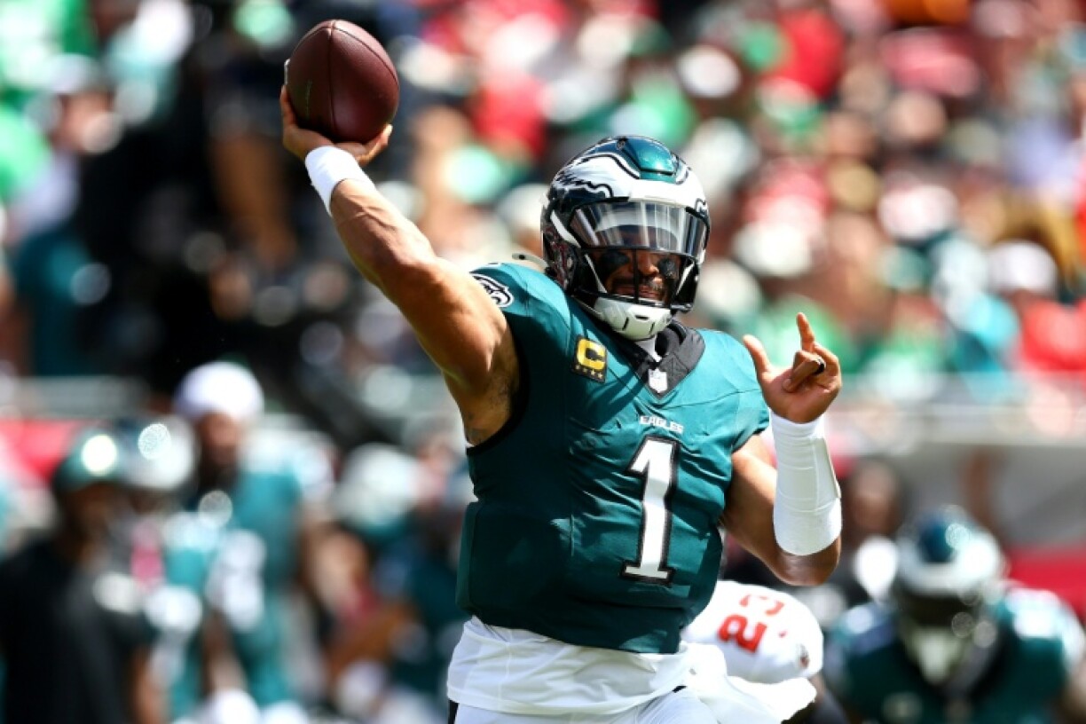 Philadelphia Eagles quarterback Jalen Hurts throws against the Tampa Bay Buccaneers in an NFL victory in Florida
