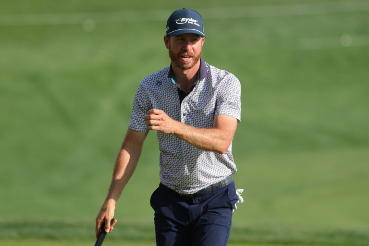American Sam Ryder reacts on the 18th green, where a birdie lifted him to the first-round lead of the US PGA Tour Texas Open