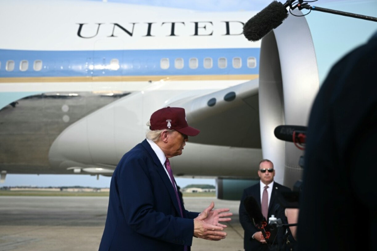 US President Donald Trump speaks to reporters after stepping off Air Force One at Joint Base Andrews on June 10, 2025