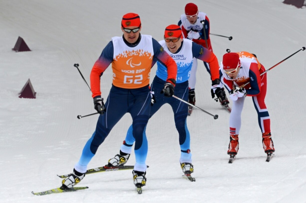 Russia's Nikolay Polukhin (2nd L) competes during the Paralympic Olympic games in Sochi on March 15, 2014