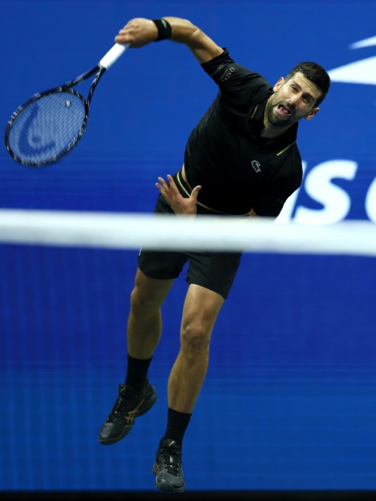 Serbia's Novak Djokovic said an improved service game helped his passage into the quarter-finals