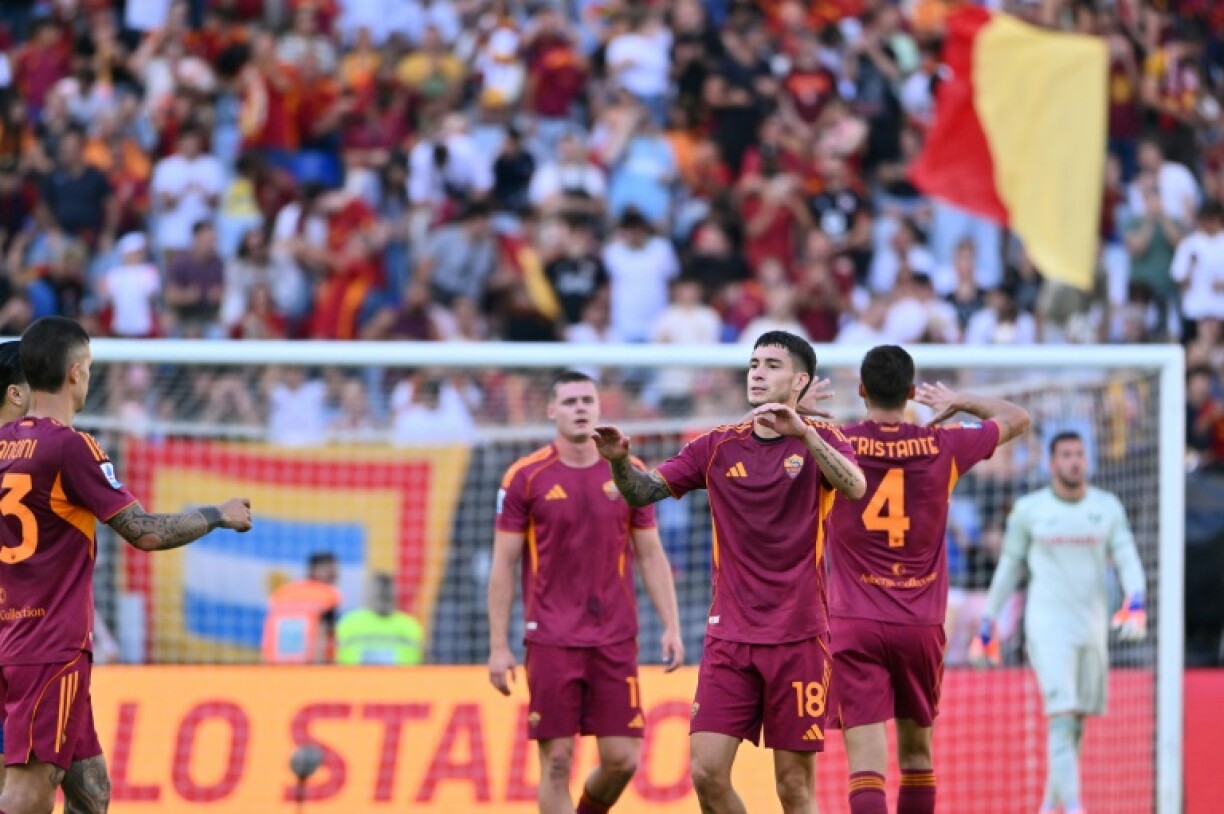 Matias Soule celebrates scoring Roma's second goal against Verona on Sunday