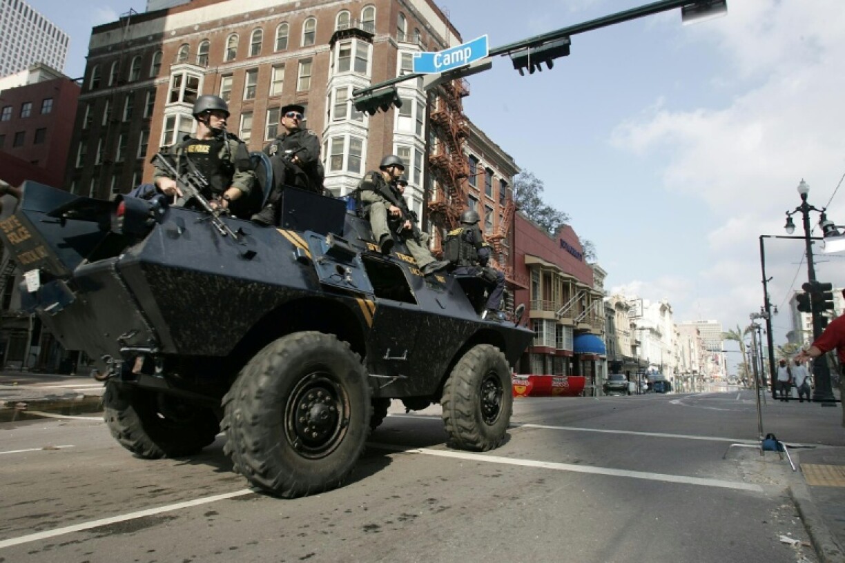 Louisiana State Police use an armored vehicle to patrol parts of New Orleans on 31 August 2005 in the aftermath of Hurricane Katrina