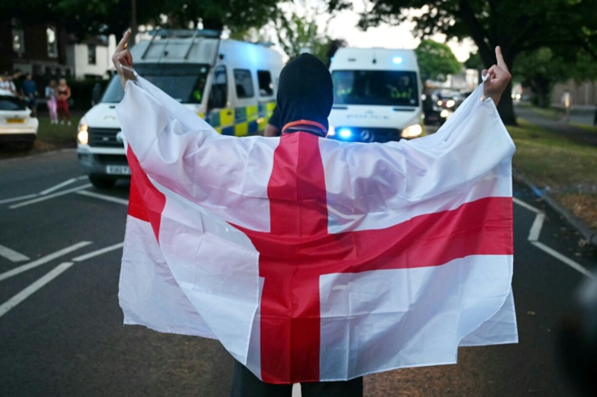 A protester during anti-migrant protests in Epping, Essex, this month
