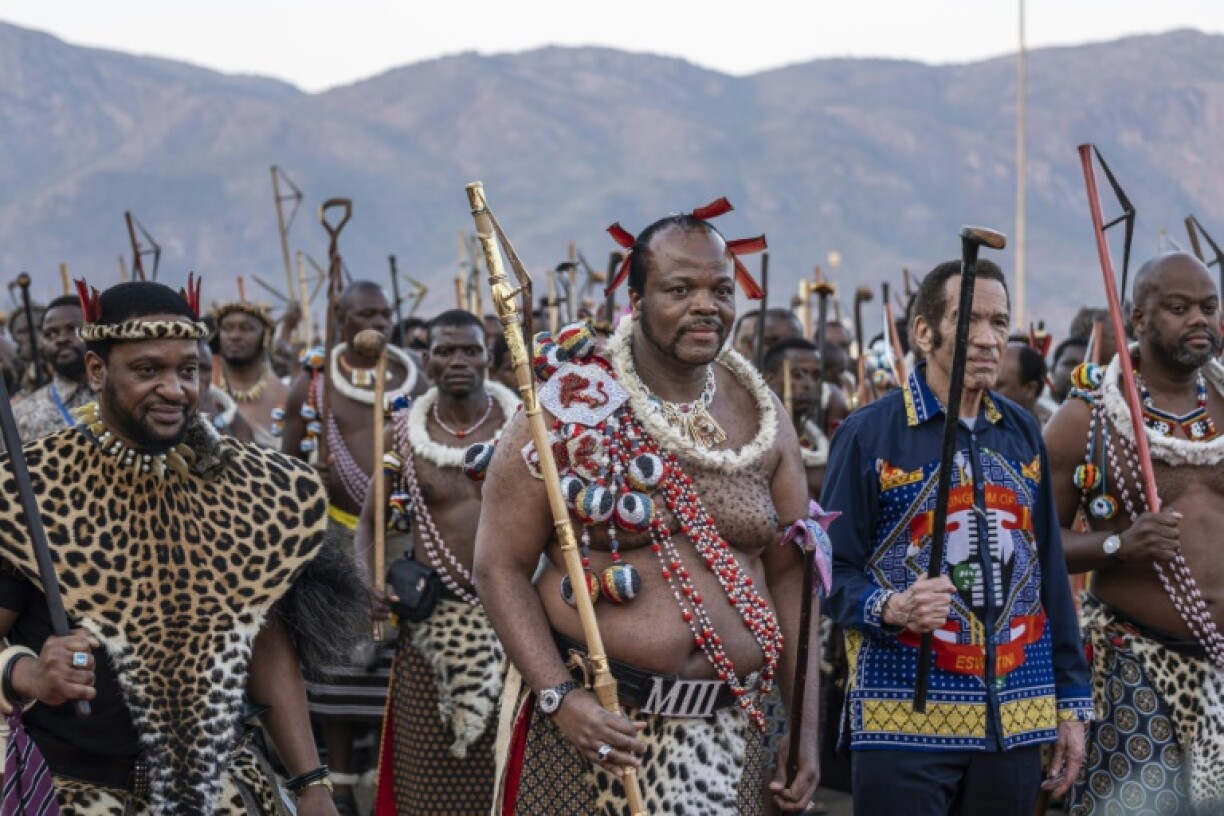 King Mswati III (C), who rules Eswatini as an absolute monarch, is known for his lavish lifestyle