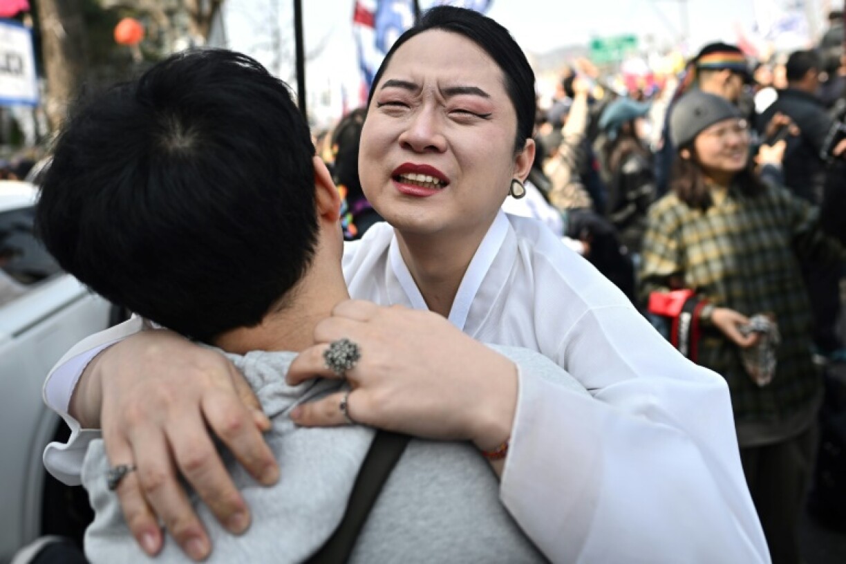 Hearing the verdict read out was a highly emotional experience for some anti-Yoon protesters