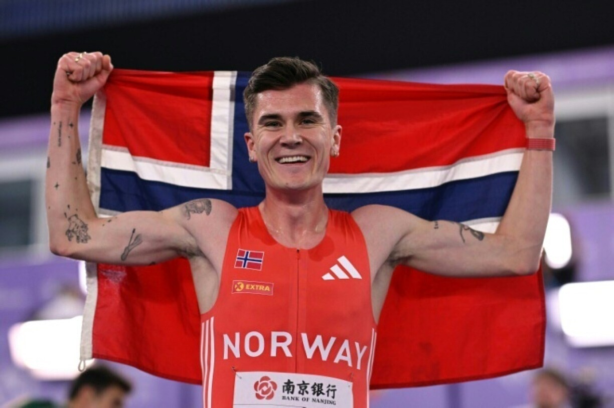 Norway's Jakob Ingebrigtsen celebrates winning the men's 3,000m final at the Indoor World Athletics Championships in Nanjing, China