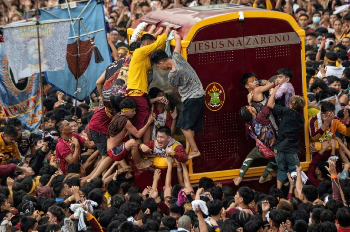 Hundreds of thousands of Philippine Catholics swarmed through the capital during the annual procession of the centuries-old Jesus the Nazarene statue