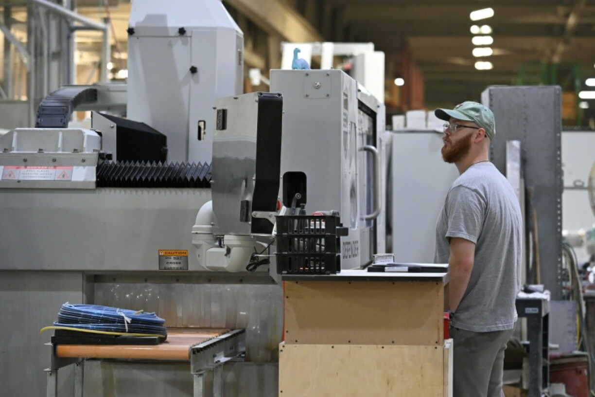 A worker at Sam Miller's factory, which produces kitchen and bathroom products, in Warren, Ohio,