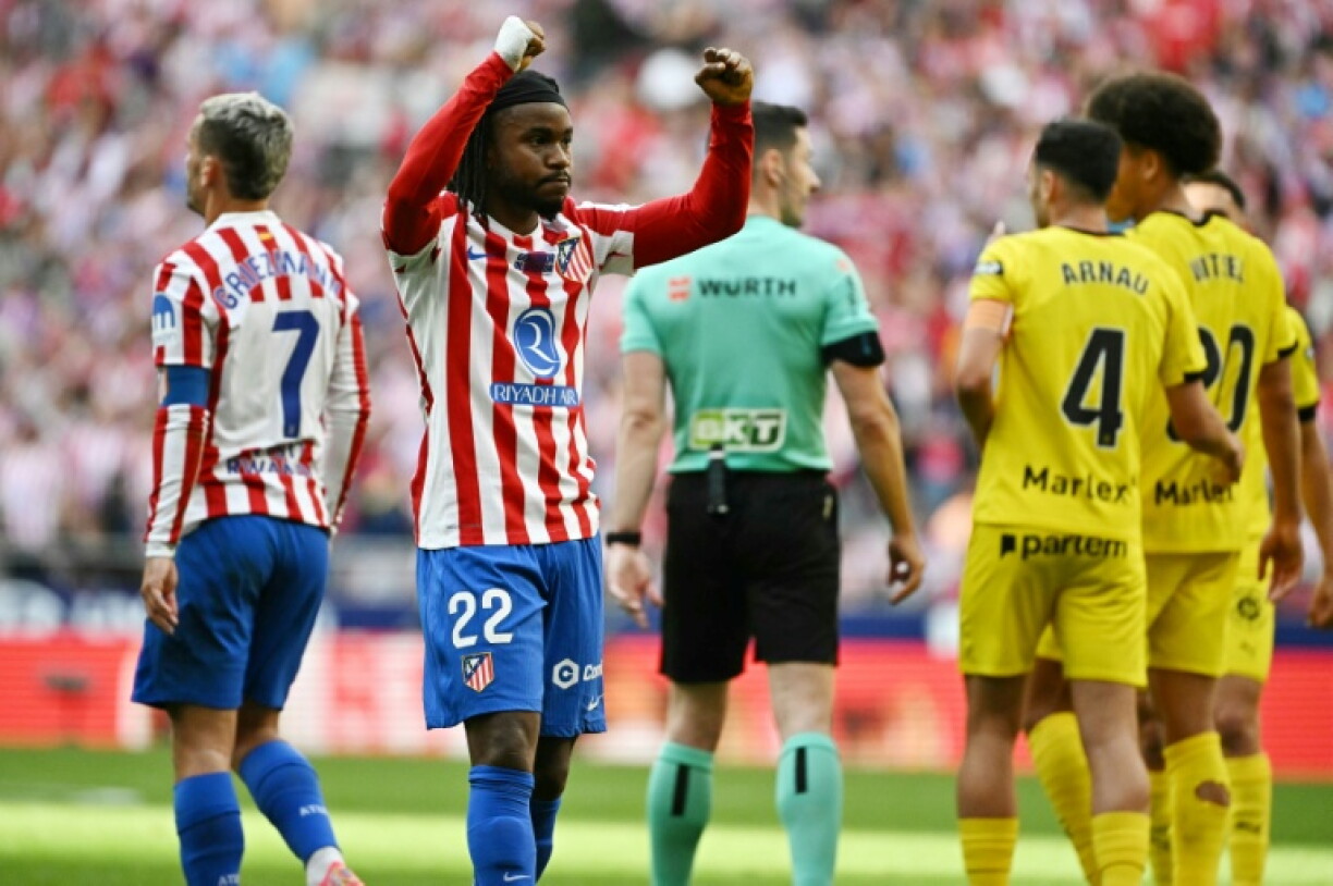 Atletico Madrid forward Ademola Lookman (2L) celebrates his winner against Girona.