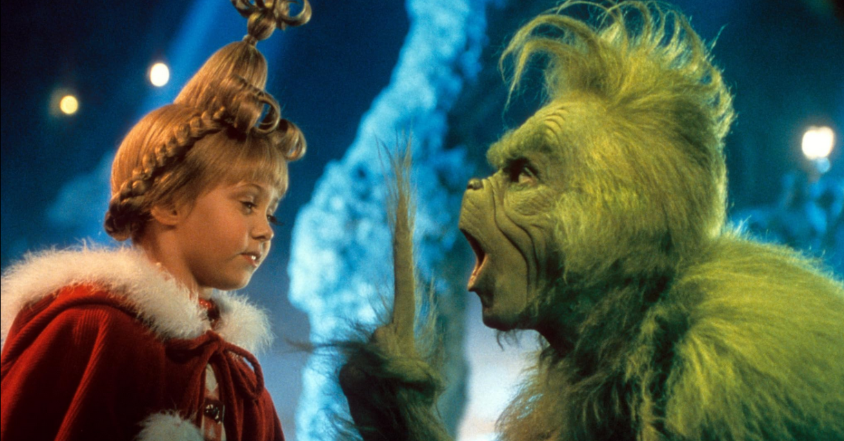 De Grinch (Jim Carrey) an d'Cindy Lou (Taylor Momsen) an der Realverflimung "How the Grinch stole Christmas" vun 2000.
