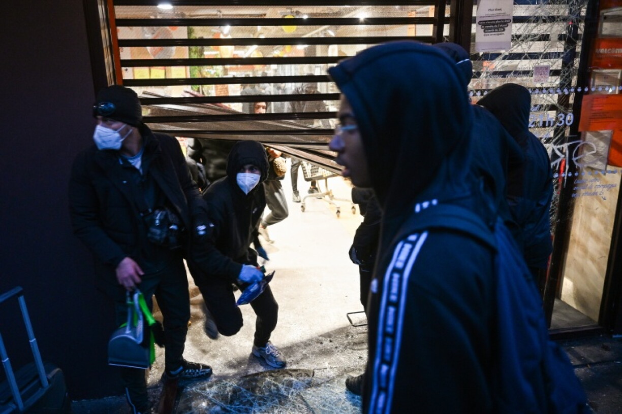 A ransacked store in Paris during protests that degenerated into violence on Sunday