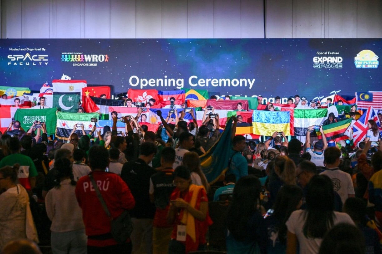 The World Robot Olympiad opened in Singapore, with participants aged 14-22 from 91 countries competing in team events