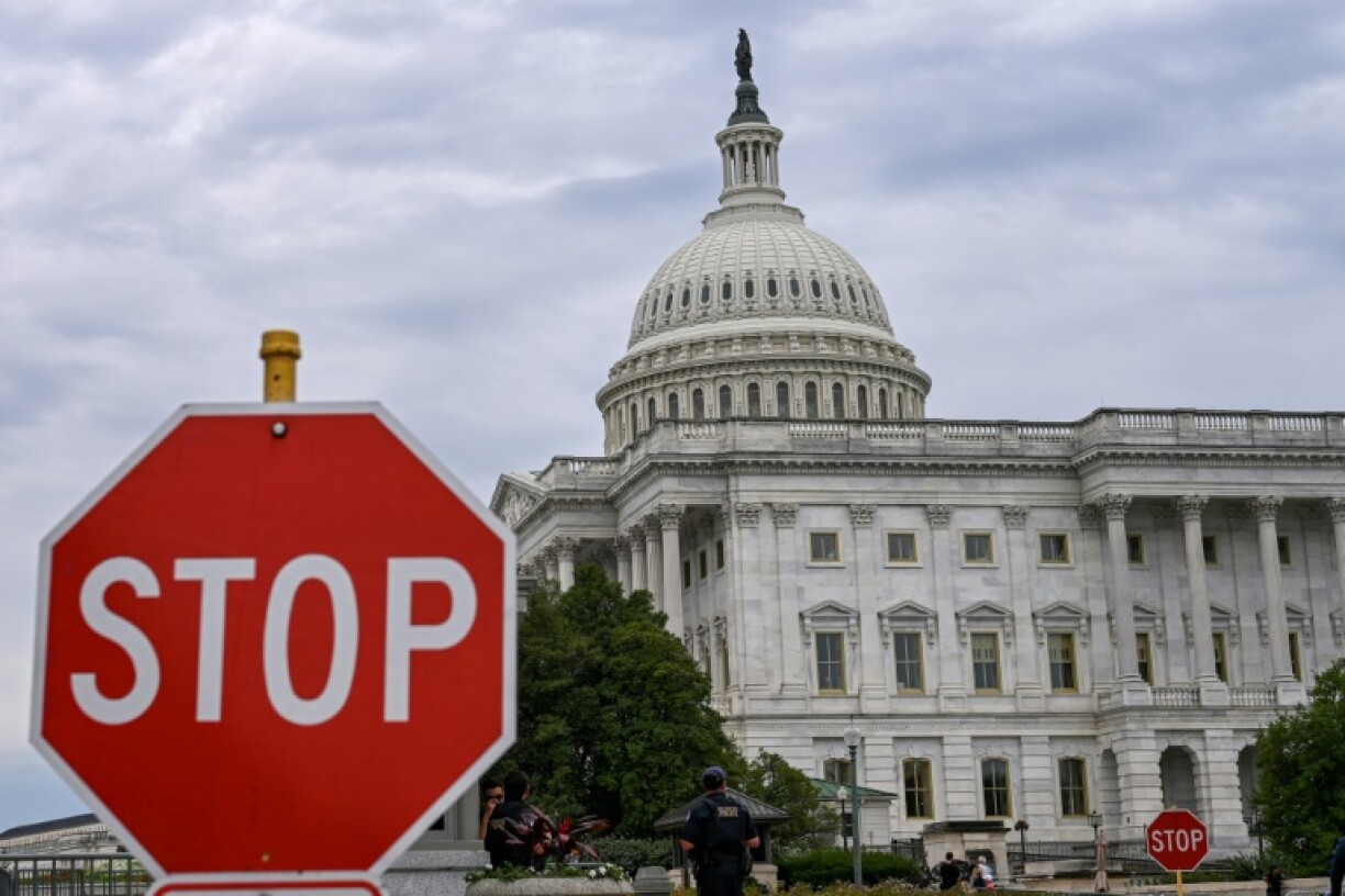 A stop sign is seen in front of the US Capitol -- where talks to reopen the federal government have seen little progress