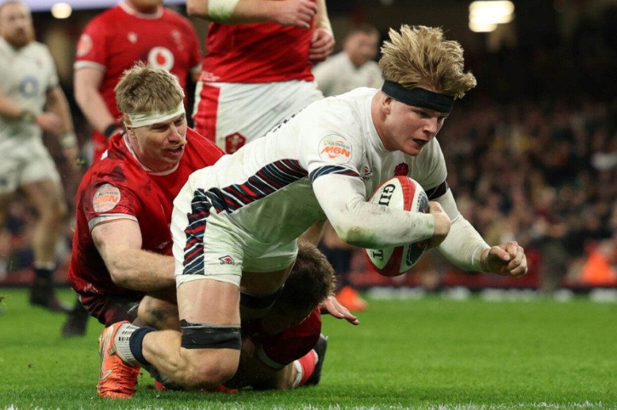 Henry Pollock scores his second try in the rout of Wales in March