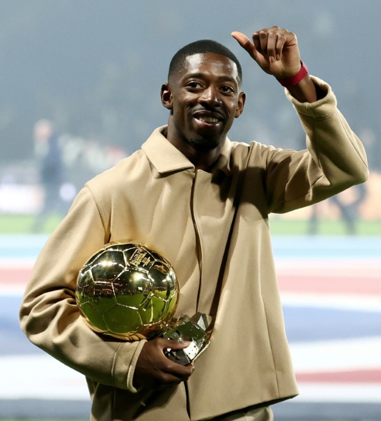Ousmane Dembele showing off his trophy last Saturday at the Parc des Princes -- the new Ballon d'Or winner will miss this midweek's trip to Barcelona due to injury