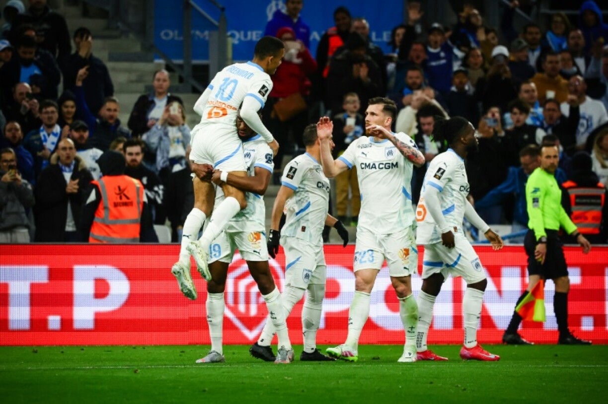 Marseille players celebrate scoring one of their goals in last week's 5-1 win over Montpellier