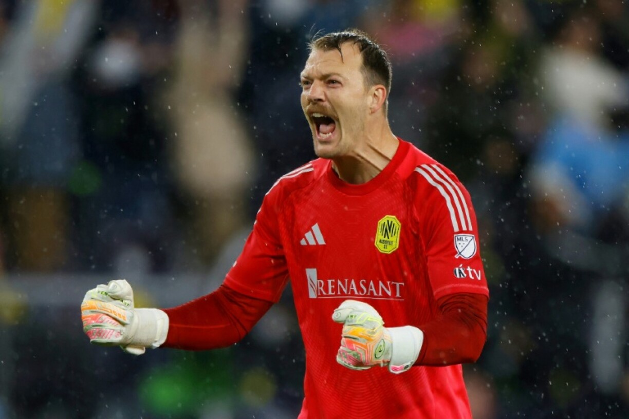 Nashville SC goalkeeper Joe Willis celebrates after teammate Sam Surridge converts a penalty in the team's MLS Cup win over Inter Miami