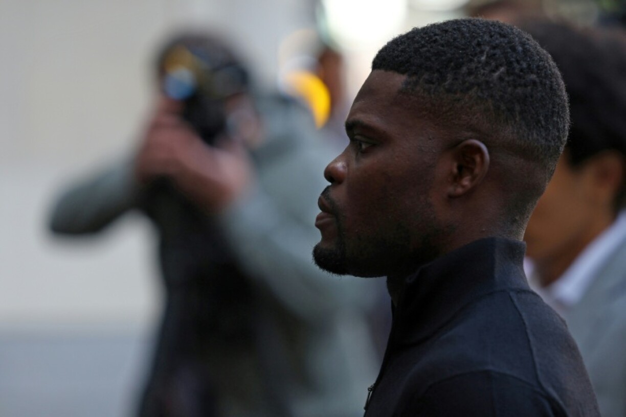 Former Arsenal midfielder Thomas Partey arrives at Westminster Magistrates' Court in London