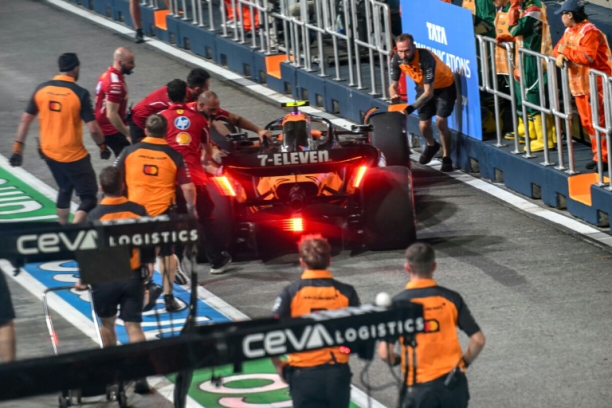 Lando Norris was shunted into the pit lane wall by Charles leclerc