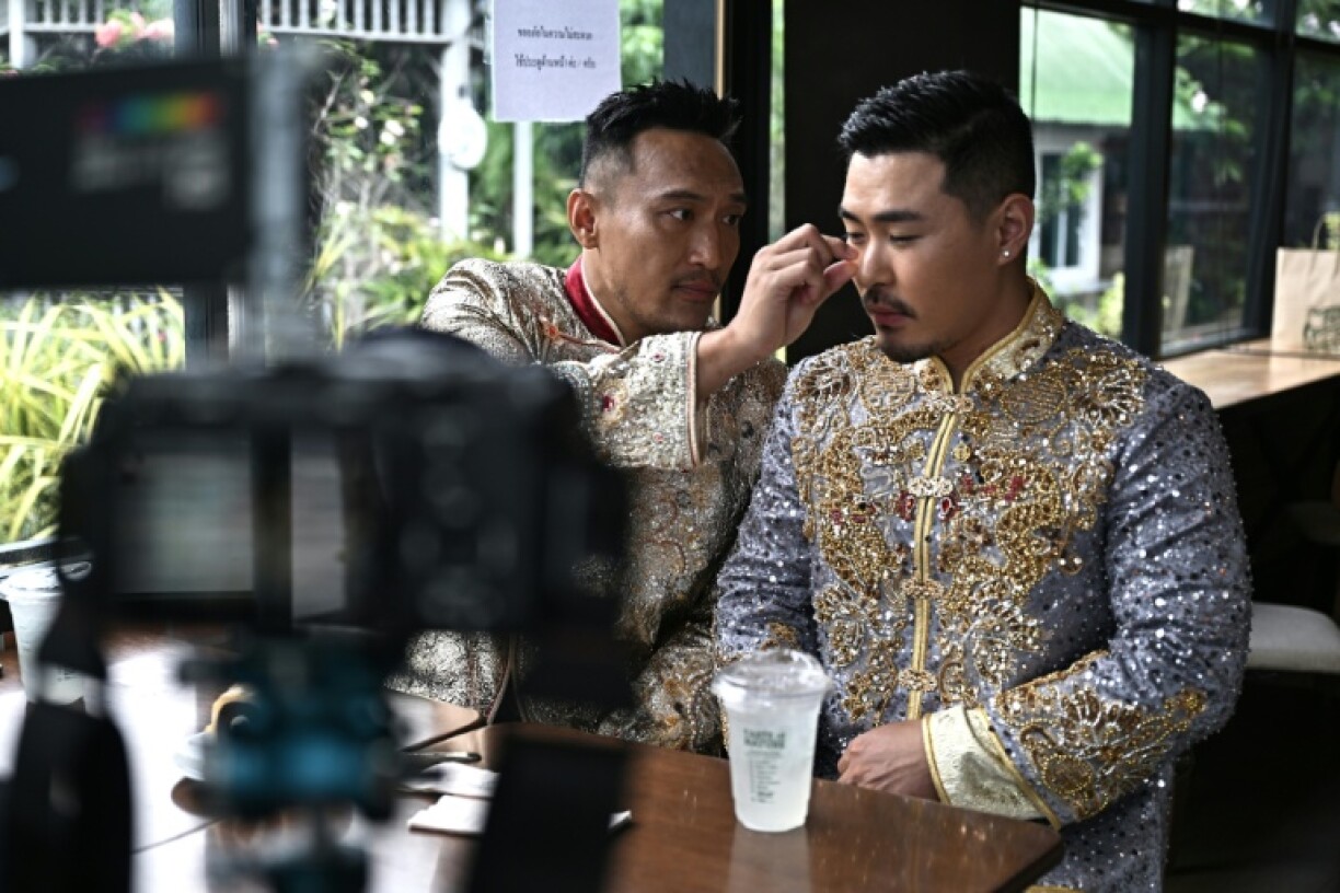 Wang, left, believes they are the first gay Chinese couple to host a full wedding ceremony in Thailand, but that more will follow