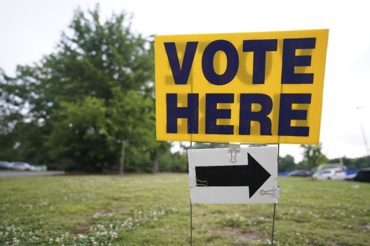 A sign directing voters for the primary election is seen on June 9, 2026 at Dreher High School in Columbia, South Carolina