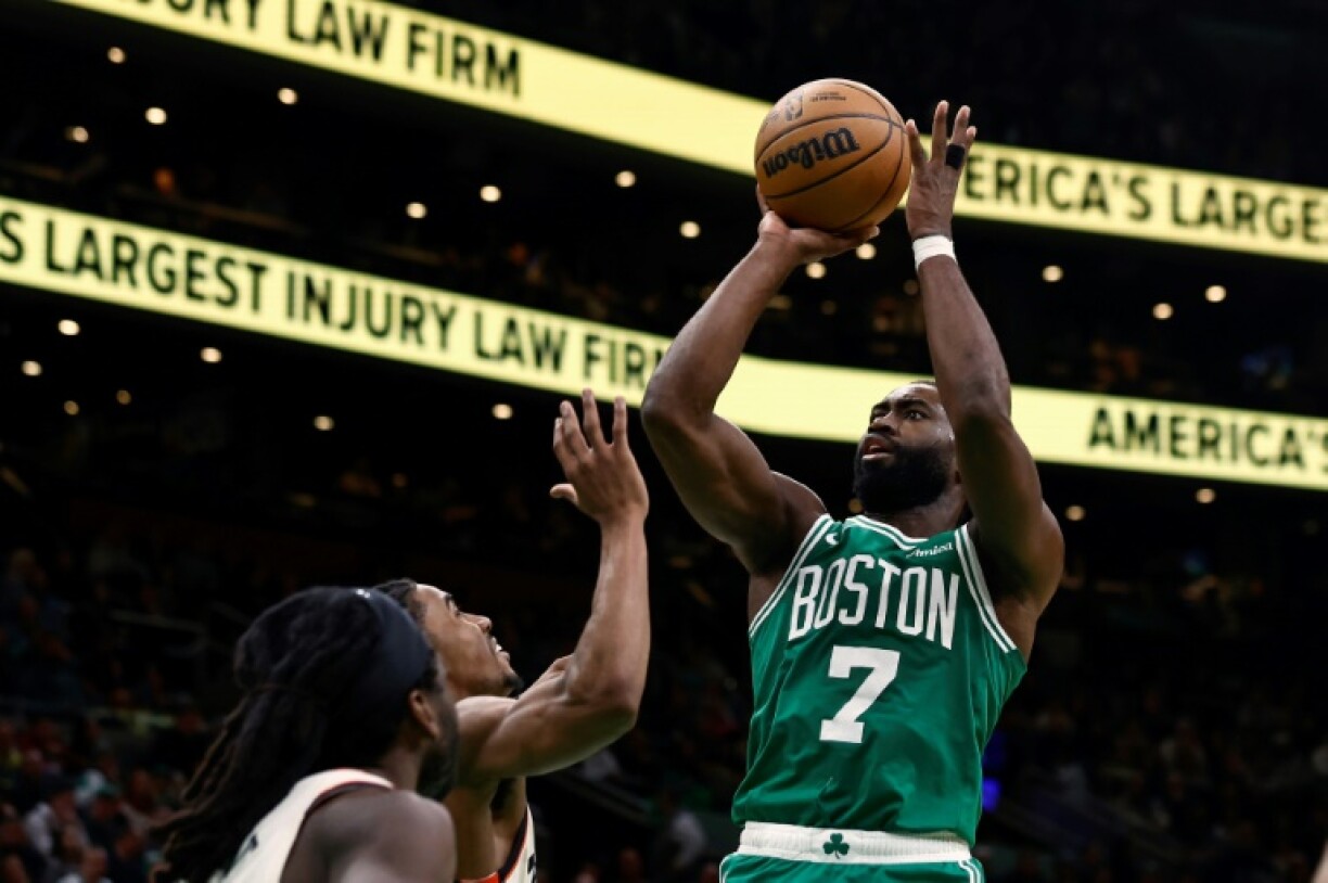 Jaylen Brown of the Boston Celtics, shooting against Detroit, was fined $25,000 by the NBA for making an