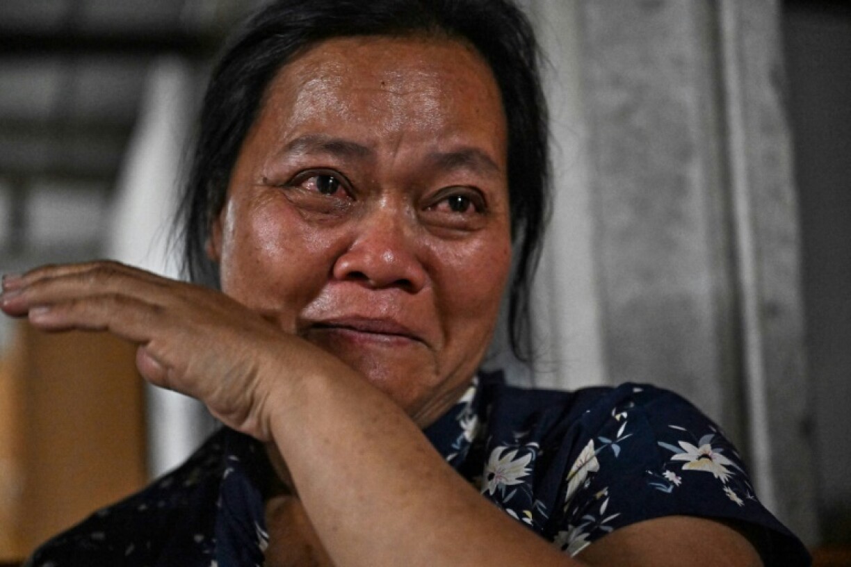 Wiwwaeo Sriaoun weeps after hearing confirmation that her son Watchara Sriaoun was among the Thai hostages freed by Hamas