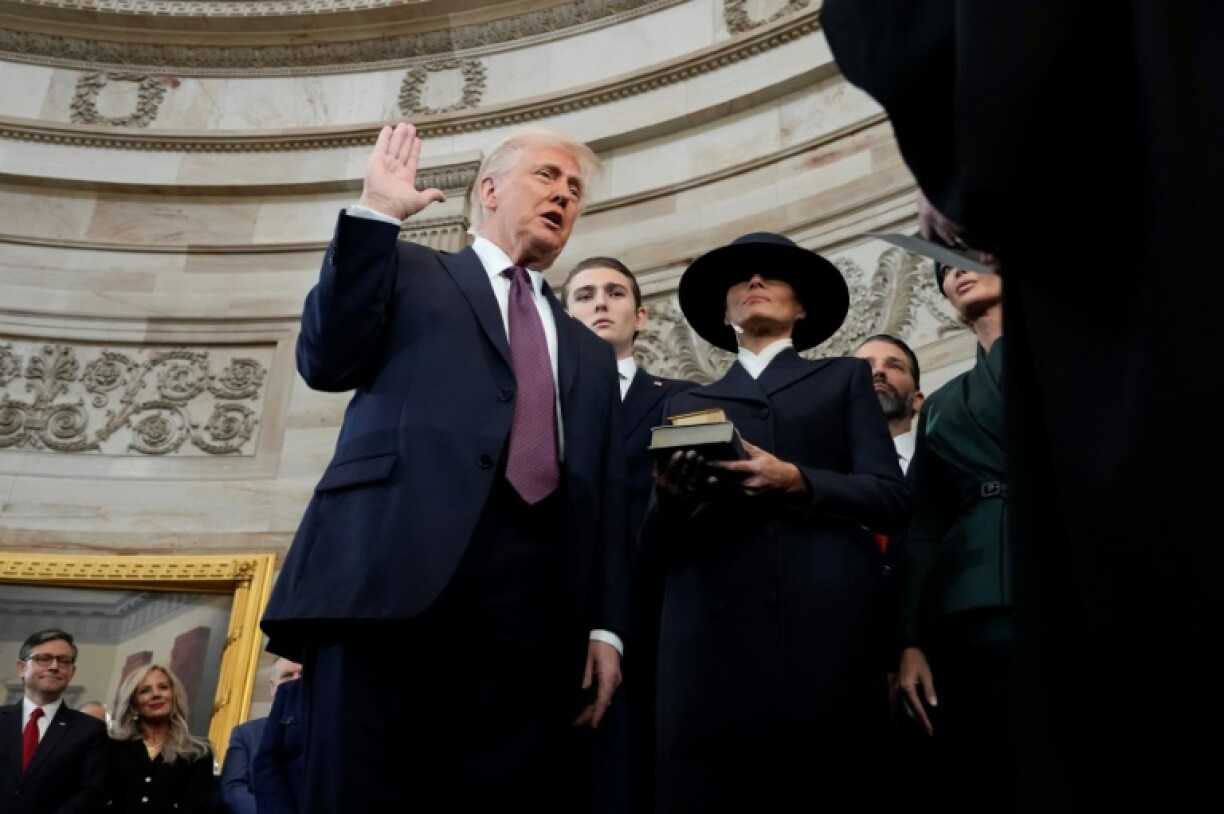 Donald Trump takes the oath of office as Melania Trump, Ivanka Trump, Donald Trump Jr. and Eric Trump look on during inauguration ceremonies in the Rotunda of the U.S. Capitol on January 20, 2025 in Washington, DC