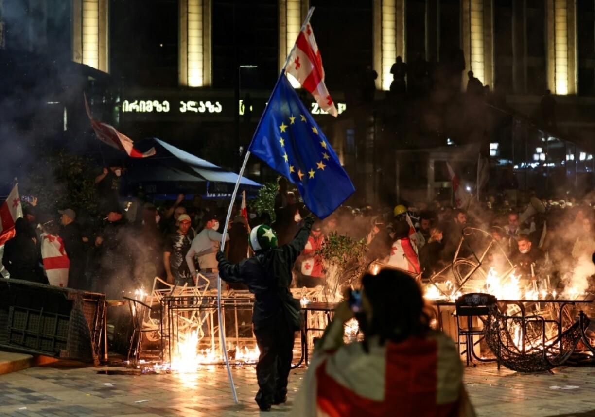 Saturday saw protesters burn barricades and clash with police during an opposition rally on the day of local elections