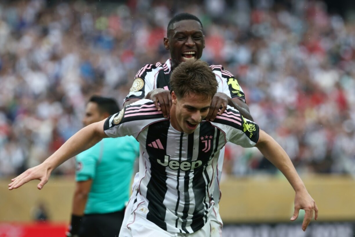 Kenan Yildiz is congratulated by Randal Kolo Muani after scoring one of his two goals for Juventus as they beat Wydad Casablanca 4-1