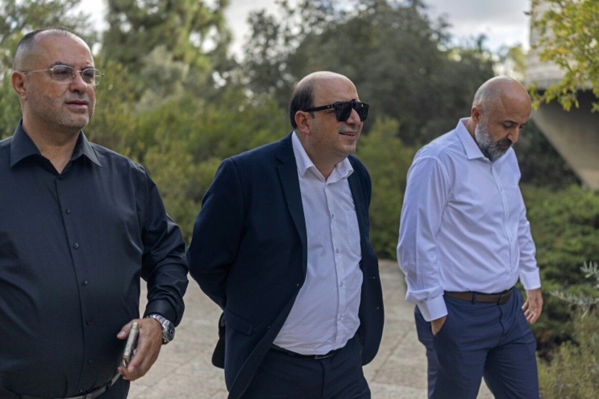 Sami Abu Shehadeh (C), leader of the Balad party, arrives at the Supreme Court in Jerusalem on October 1, 2026