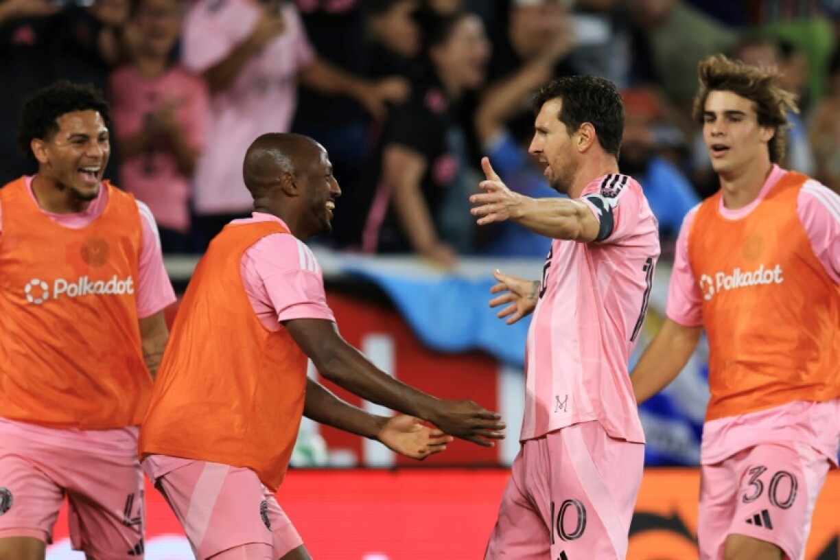 Lionel Messi celebrates with his Inter Miami team-mates after scoring the second of two goals in a thrashing of the New York Red Bulls