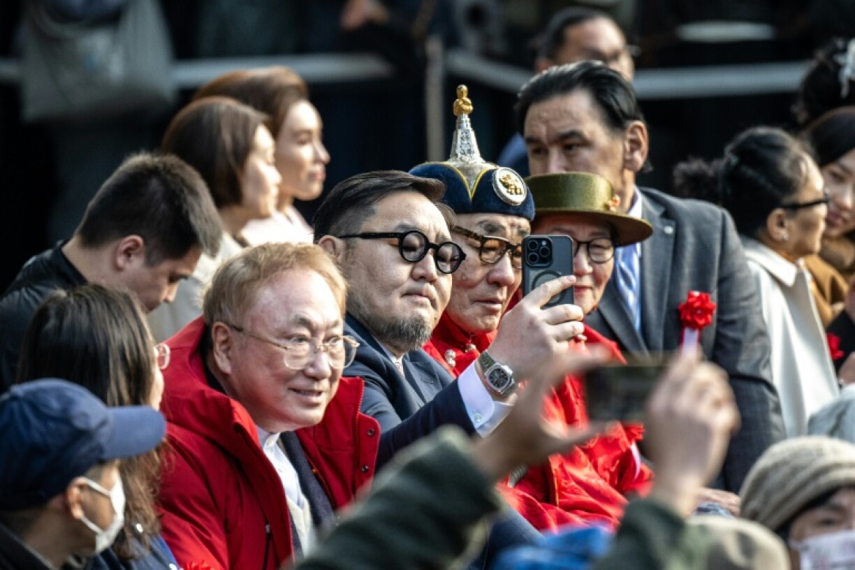 Wrestler Asashoryu (C) was known as the bad boy of sumo and he was forced to retire in 2010 after breaking a man's nose