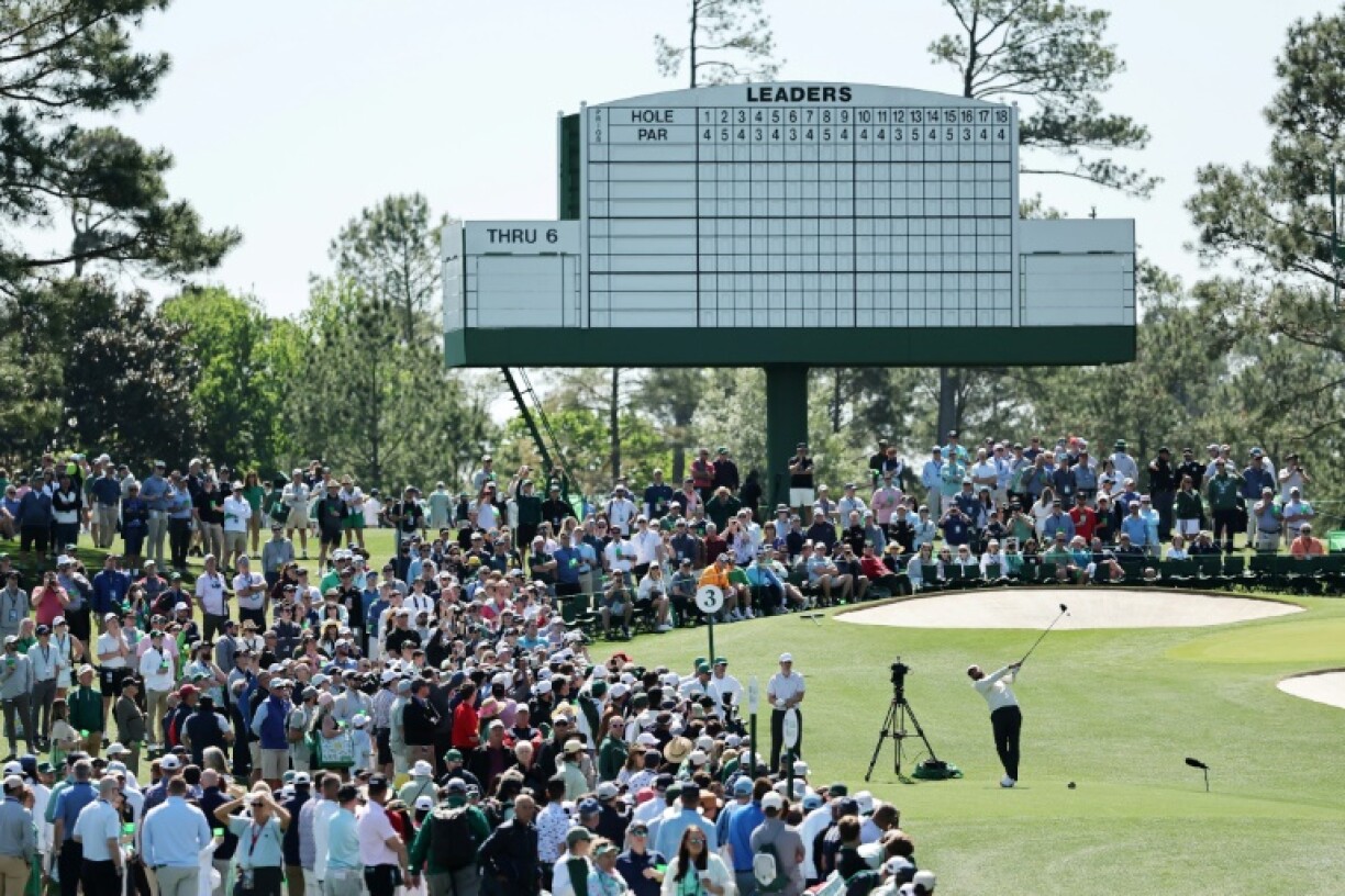 A general view as Scottie Scheffler plays his shot from the third tee during a practice round prior to the 2025 Masters at Augusta National