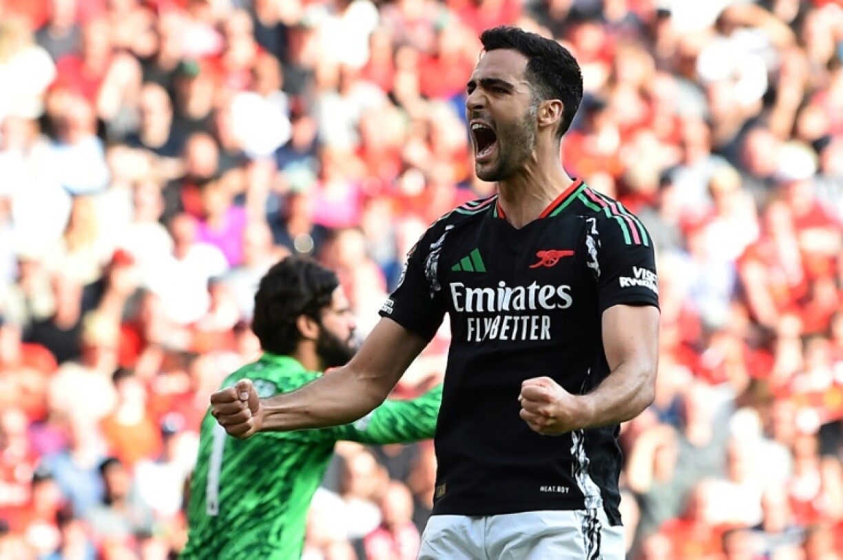 Arsenal midfielder Mikel Merino celebrates after scoring at Liverpool
