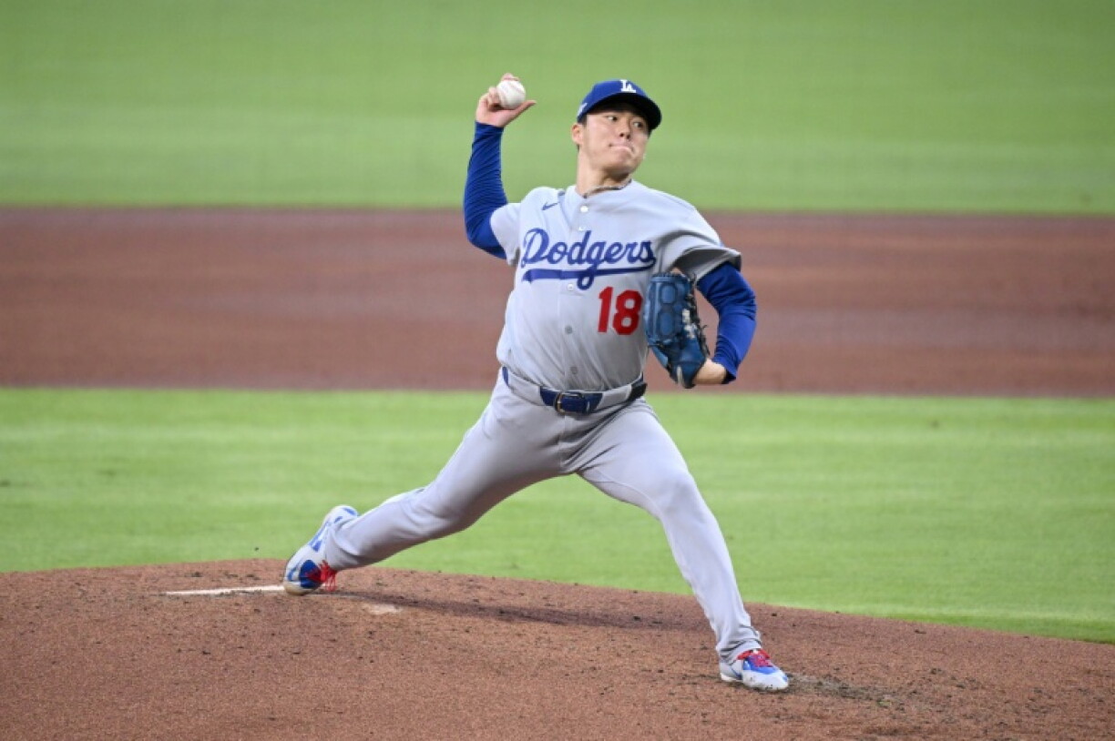 Japanese pitcher Yoshinobu Yamamoto struck out 10 in seven innings to spark the Los Angeles Dodgers to victory in Atlanta in the MLB playoffs
