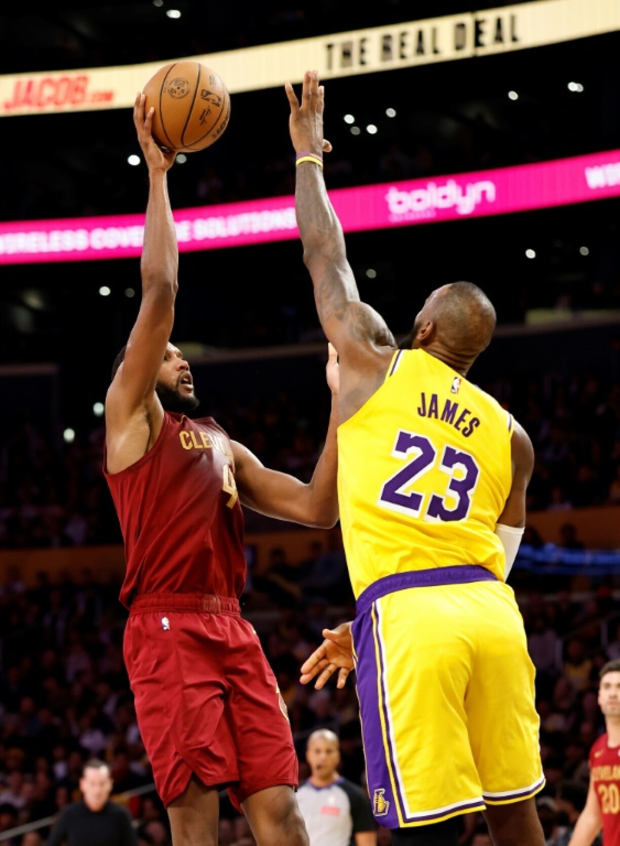 Evan Mobley of the Cleveland Cavaliers takes a shot over LeBron James in the Cavaliers' NBA victory over the Los Angeles Lakers