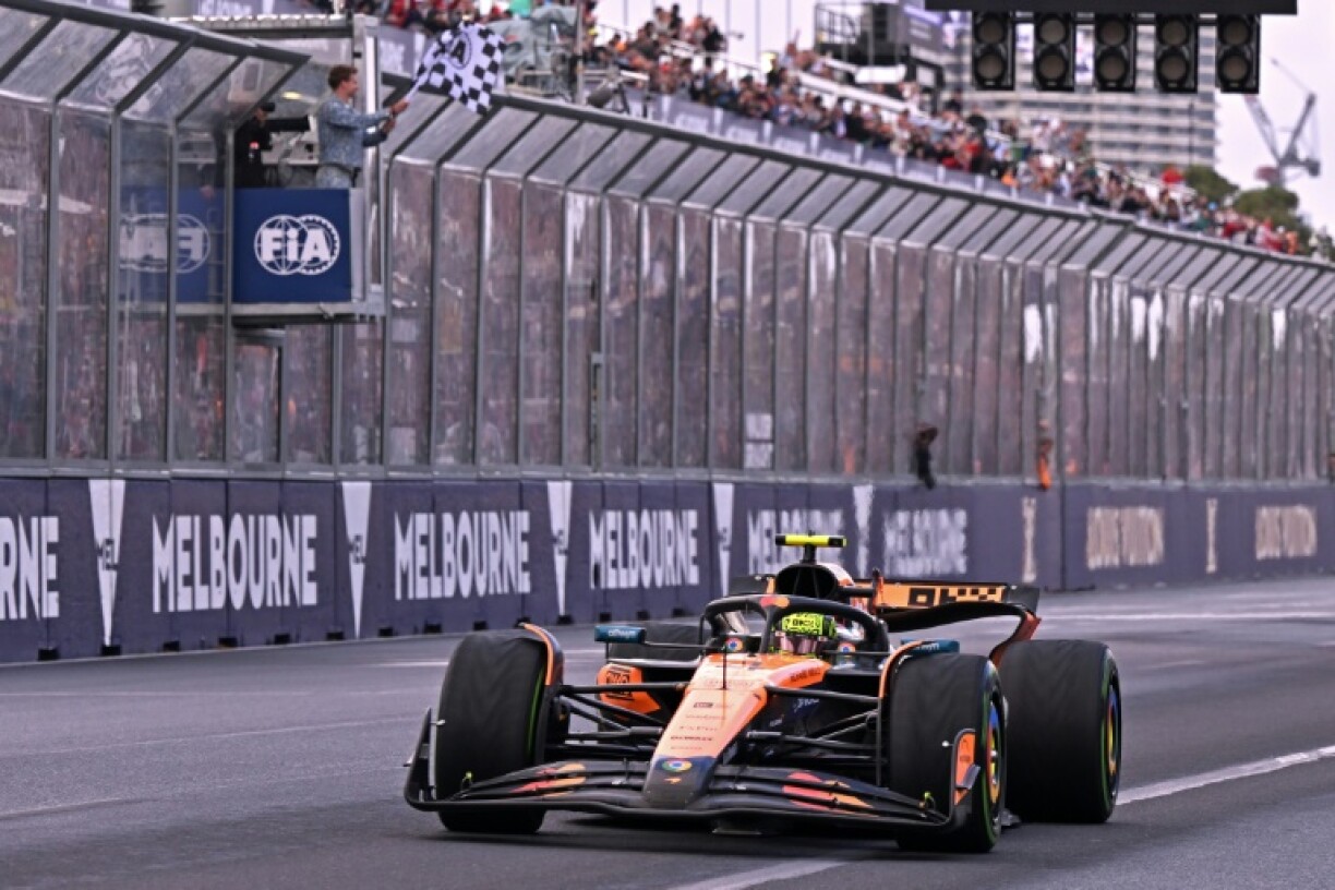 Lando Norris takes the chequered flag at the Australian Grand Prix