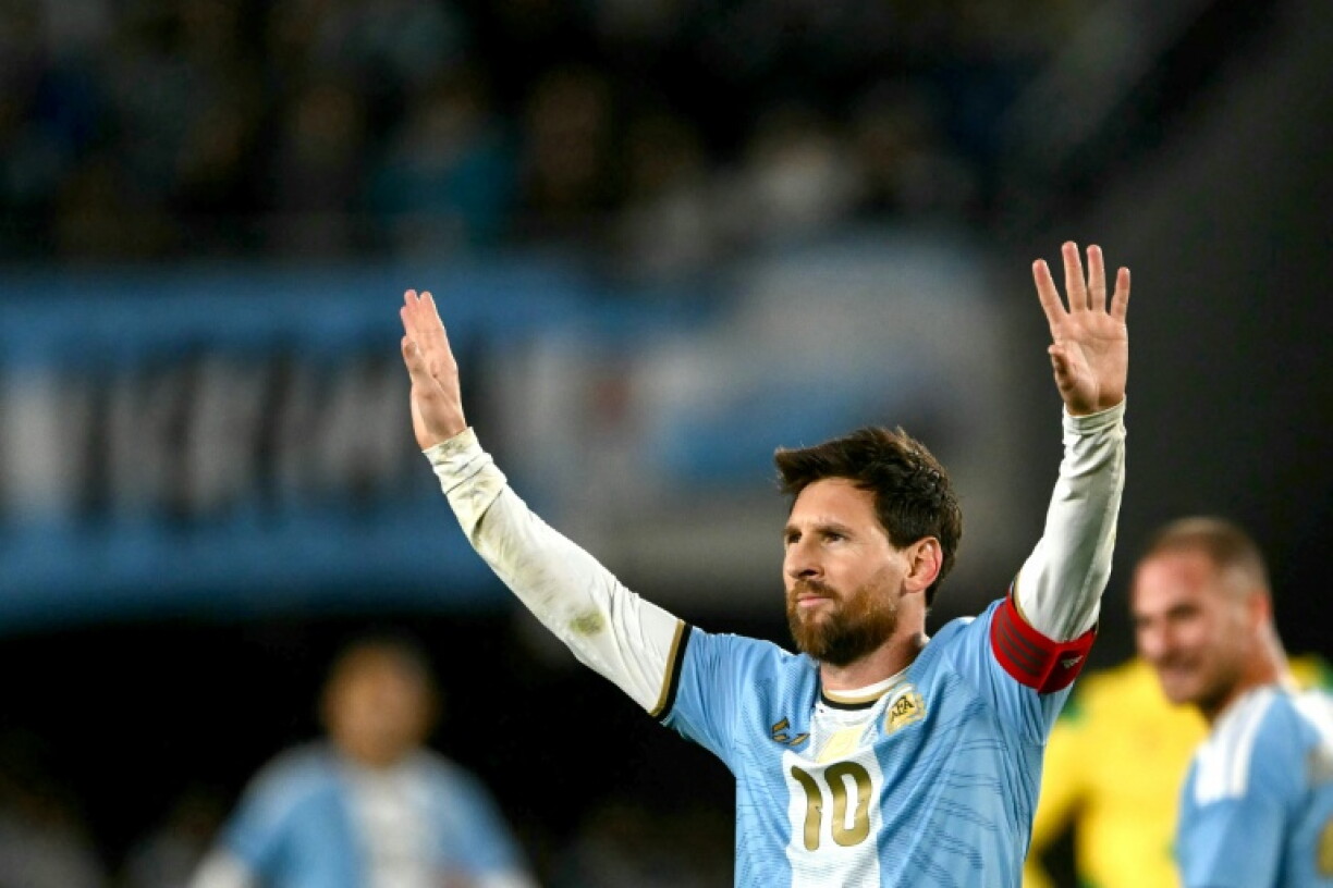 Lionel Messi celebrates scoring in his final international appearance for Argentina