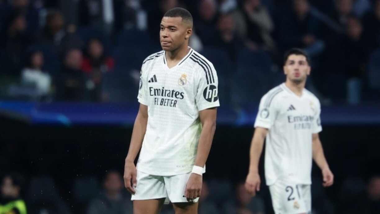 L'attaquant français du Real Madrid Kylian Mbappe (C) lors du match de Ligue des champins contre l'AC Milan, le 5 novembre 2024 au stade Santiago-Bernabéu