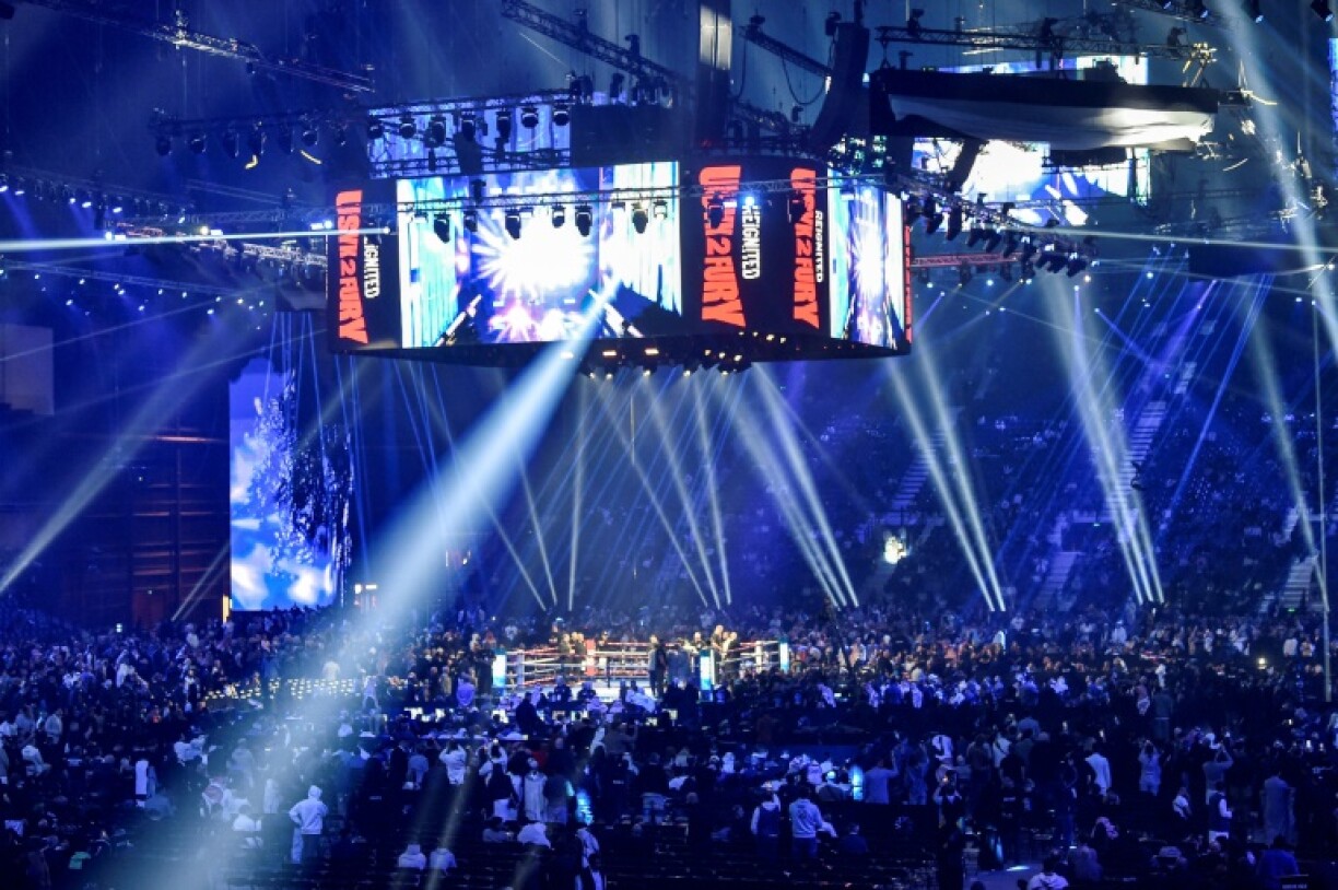 Spectators await the start of the heavyweight world championship rematch between Britain's Tyson Fury and Ukraine's Oleksandr Usyk at the Kingdom Arena in Riyadh